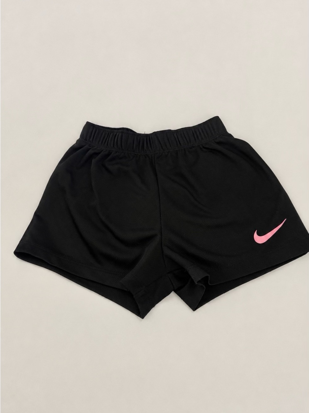 Nike Black Women’s Athletic Shorts with Pink Swoosh